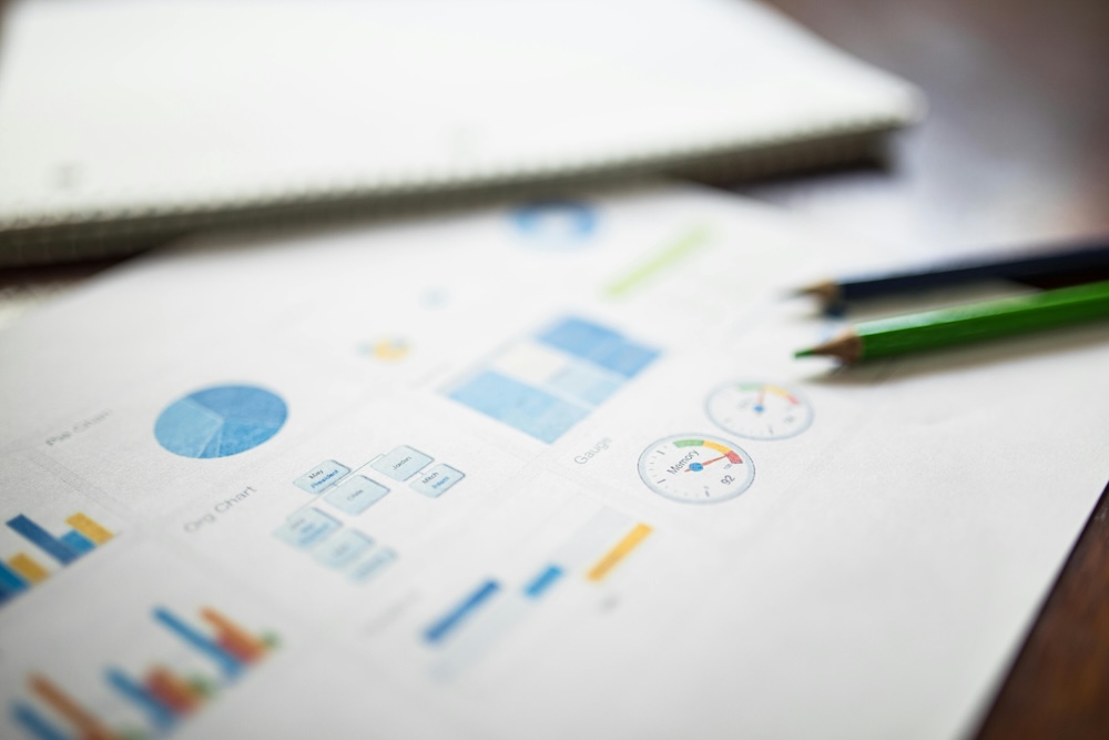 Financial Report and Two Colored Pencils